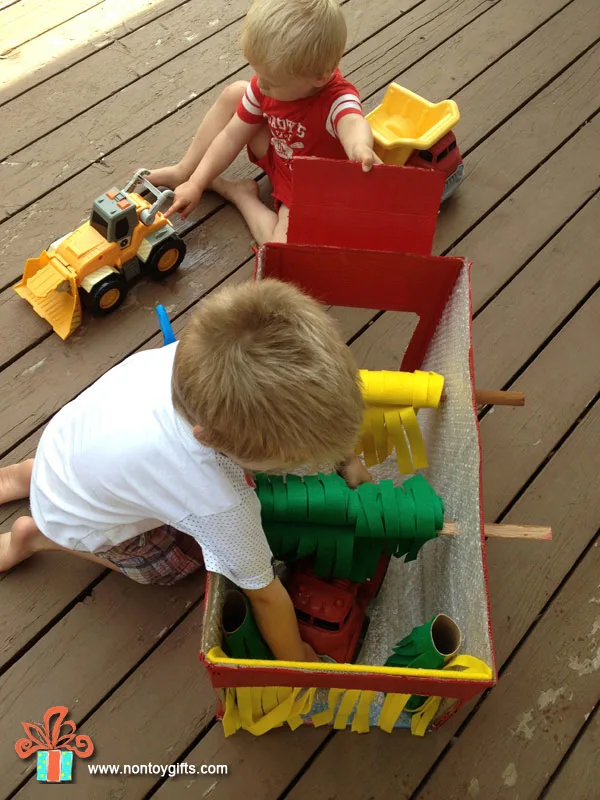 Make a cardboard car wash from a box. DIY cardboard toy for kids. Learn how to make it waterproof so kids can actually play with water. Fun summer activity. | at Non Toy Gifts