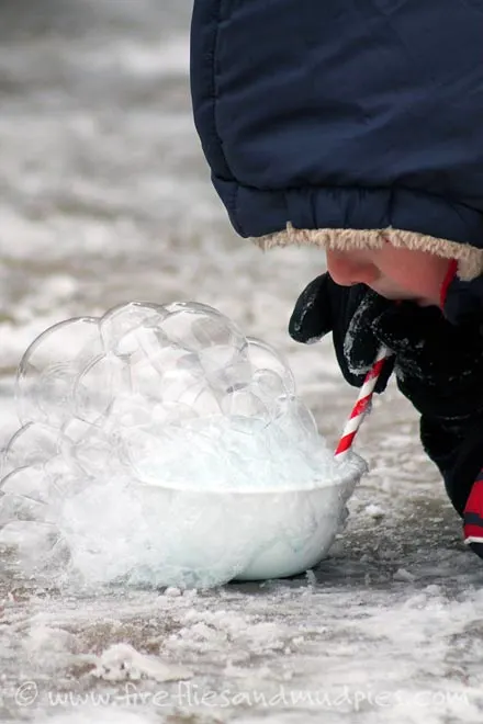 Blow bubbles and watch them freeze - one of the 20 outdoor snow activities for kids. Be prepared for that snowy day when school is off and kids want to go outside and play. This list of snow and ice activities for kids of all ages is just what you need for any winter day. | at Non Toy Gifts