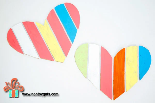 A simple and fun Valentine craft for preschoolers. Make a heart and paint it. Homeschool or classroom Valentine activity. The outcome of this craft is a kid made Valentine decoration. Fun!