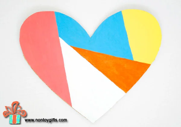 Simple DIY upcycled Valentine decoration made from a cardboard box.