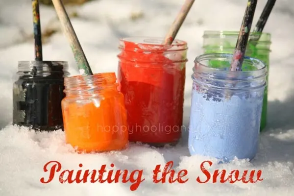 Pain the snow - one of the 20 outdoor snow activities for kids. Be prepared for that snowy day when school is off and kids want to go outside and play. This list of snow and ice activities for kids of all ages is just what you need for any winter day. | at Non Toy Gifts