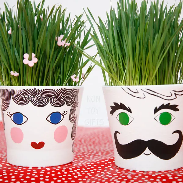 Grass head pots - a fun spring gardening craft for kids. Plant the seeds, water and wait for the grass to grow. | at Non Toy Gifts