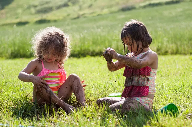Kids playing in the mud