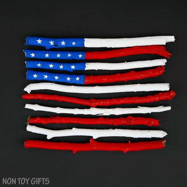 An easy flag craft for kids that uses sticks and twigs. Perfect for 4th of July, Memorial Day or Flag Day. | at Non Toy Gifts