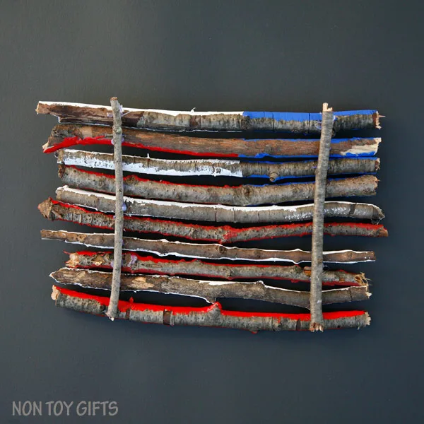 An easy flag craft for kids that uses sticks and twigs. Perfect for 4th of July, Memorial Day or Flag Day. | at Non Toy Gifts