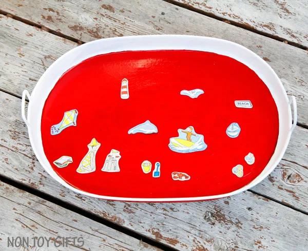 Road trip with kids - DIY busy tray. Use it as a snack tray, drawing tray, magnetic tray and chalk board. | at Non Toy Gifts