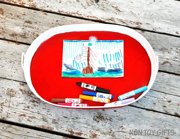 Road trip with kids - DIY busy tray. Use it as a snack tray, drawing tray, magnetic tray and chalk board. | at Non Toy Gifts