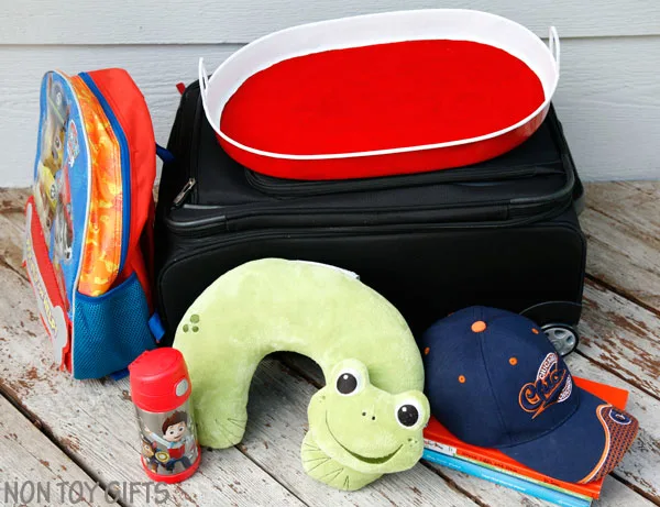 Road trip with kids - DIY busy tray. Use it as a snack tray, drawing tray, magnetic tray and chalk board. | at Non Toy Gifts