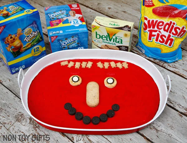 Road trip with kids - DIY busy tray. Use it as a snack tray, drawing tray, magnetic tray and chalk board. | at Non Toy Gifts