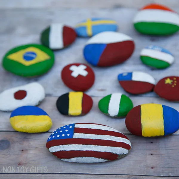 Painted flag rocks - a creative and educational Olympic craft. A great opportunity for kids to learn about the participating countries to the Olympics. | at Non Toy Gifts