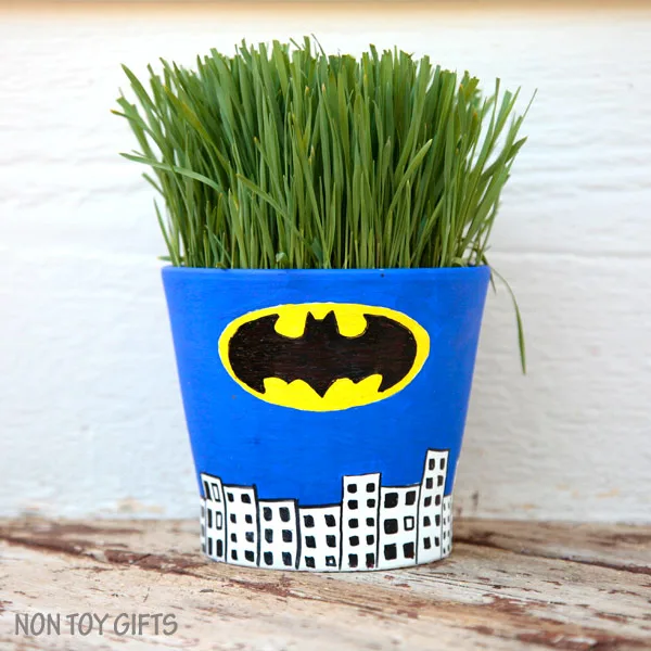 Superhero grass pots - fun craft for kids