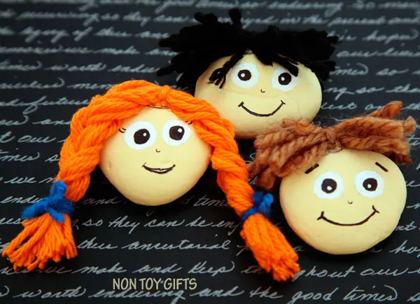 PAINTED ROCK PEOPLE. Kids can use these happy face rocks for creative play. Fun activity for children of all ages. | at Non Toy Gifts