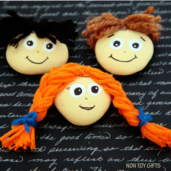 PAINTED ROCK PEOPLE. Kids can use these happy face stones for creative play. Fun activity for children of all ages. | at Non Toy Gifts