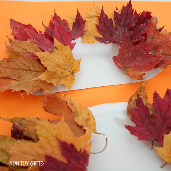Easy Thanksgiving craft for kids. Make a turkey using a butternut and autumn leaves. | at Non-Toy Gifts