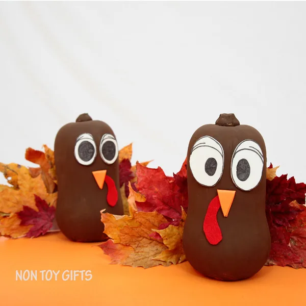 Easy Thanksgiving craft for kids. Make a turkey using a butternut and autumn leaves. | at Non-Toy Gifts