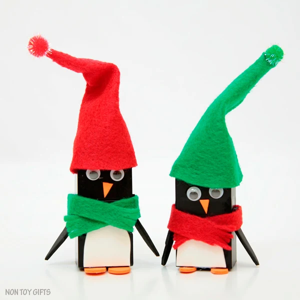 LEGO penguin ornaments. Kid-made ornaments. Book inspired. Easy penguin craft to try this winter with kids. | at Non-Toy Gifts
