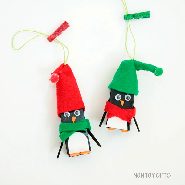 LEGO penguin ornaments. Kid-made ornaments. Book inspired. Easy penguin craft to try this winter with kids. | at Non-Toy Gifts