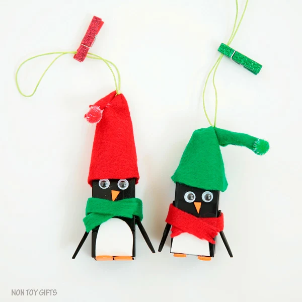 LEGO penguin ornaments. Kid-made ornaments. Book inspired. Easy penguin craft to try this winter with kids. | at Non-Toy Gifts