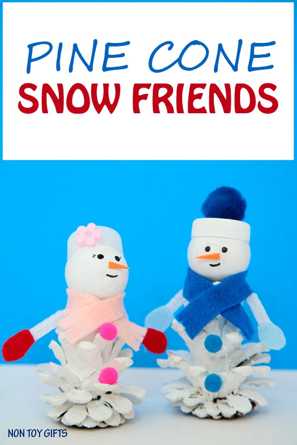Pine cone snow friends. A snowman and snow woman craft for kids to try this winter when it's too cold to play outside. | at Non Toy Gifts