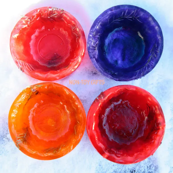 Colorful ice bowls to make for kids. Perfect addition to a snow kitchen. Fun winter activity. Kids will love to play with them. | at Non-Toy Gifts