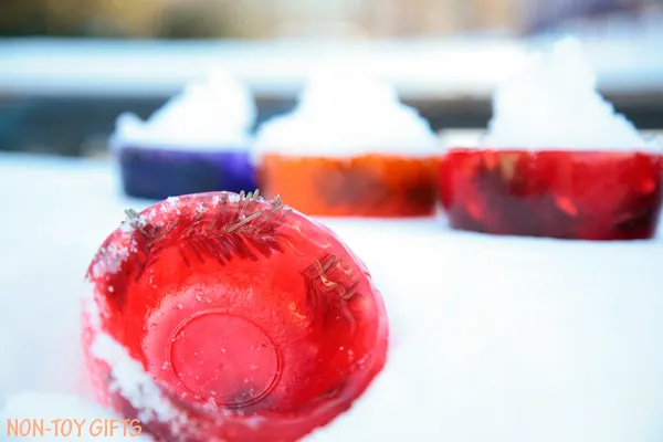 Colorful ice bowls to make for kids. Perfect addition to a snow kitchen. Fun winter activity. Kids will love to play with them. | at Non-Toy Gifts