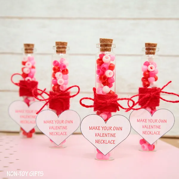 Make Your Own Valentine Necklace is a sweet and simple DIY Valentine favor that you can make for your kid's friends and classmates.