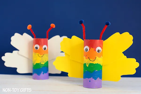 Paper roll rainbow handprint butterfly craft for kids. Perfect spring craft or St. Patrick's Day craft. Easy for toddlers to make. | at Non-Toy Gifts