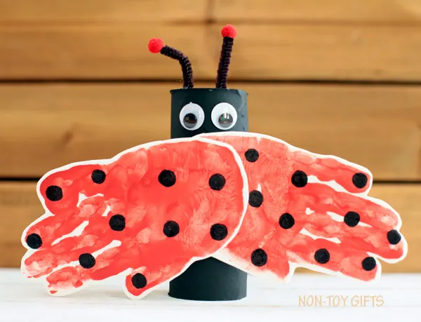 A handprint and paper roll ladybug craft for kids. It is an easy spring craft or for learning about insects. | at Non-Toy Gifts