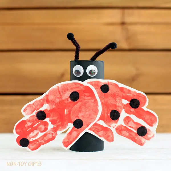 A handprint and paper roll ladybug craft for kids. It is an easy spring craft or for learning about insects. | at Non-Toy Gifts