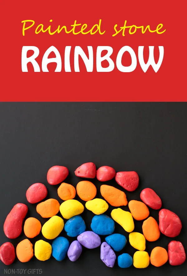 Painted stone rainbow craft for kids. Celebrate spring with a fun and easy craft for toddlers and older kids. | at Non-Toy Gifts