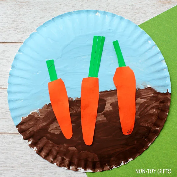 Easy paper plate carrot craft for toddlers, preschoolers and older kids to try this spring or Easter. Carrots in the garden. | at Non-Toy Gifts