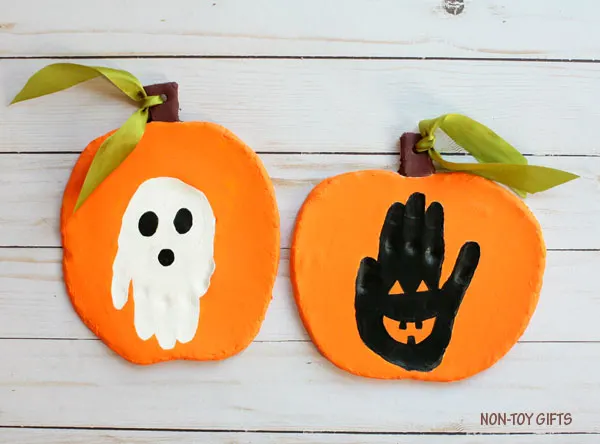 Handprint Halloween keepsake craft : handprint ghost and handprint Jack-o-Lantern