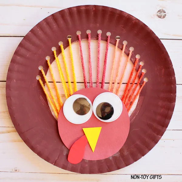Yarn and paper plate turkey craft for kids