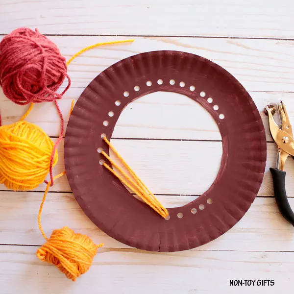 Paper plate with holes