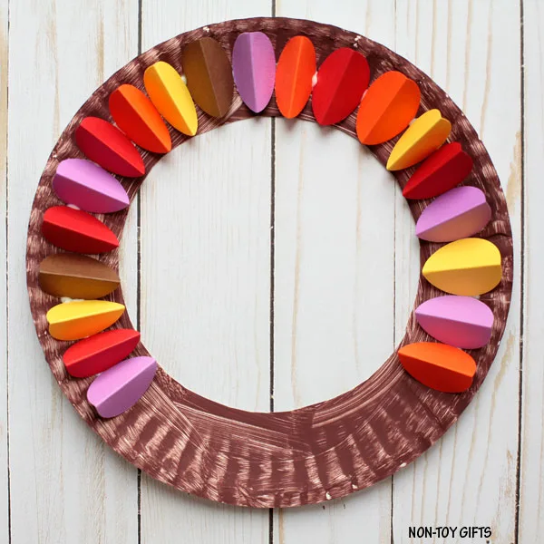 paper plate with feathers
