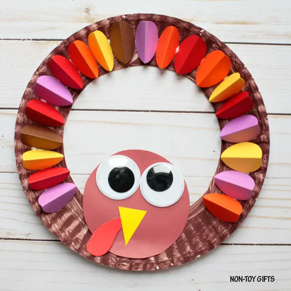 Paper plate turkey wreath craft for kids