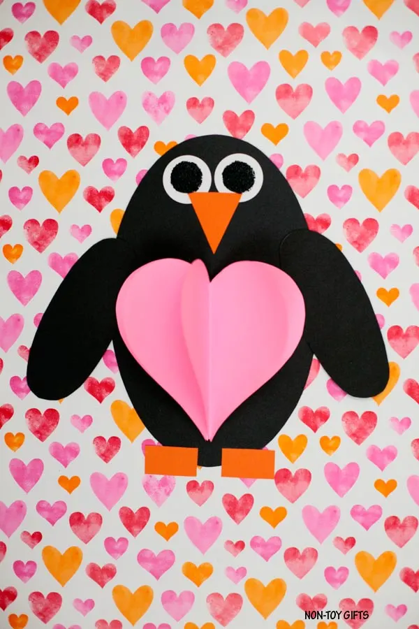 Shape penguin with 3D heart craft for Valentine's Day #ValentinesDaycraft #penguins #penguincraft #heartcraft
