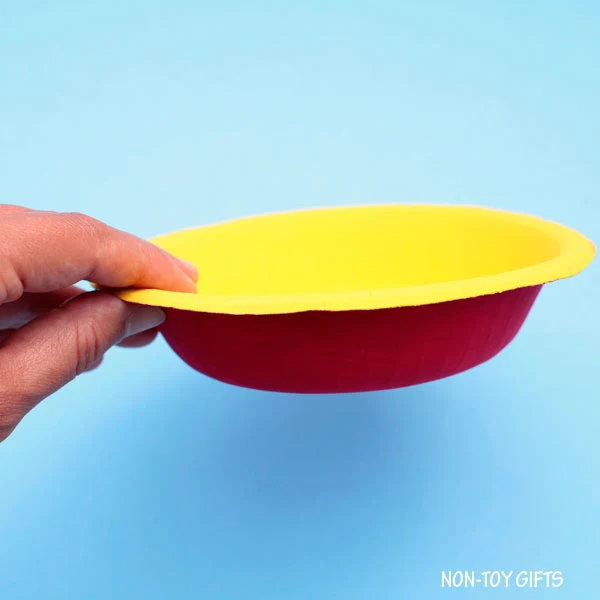 Paint the inside of the paper bowl