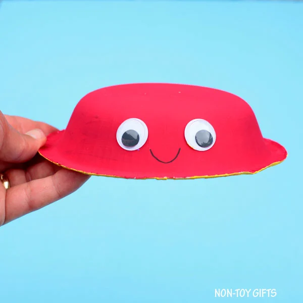 Googly eyes on paper bowl
