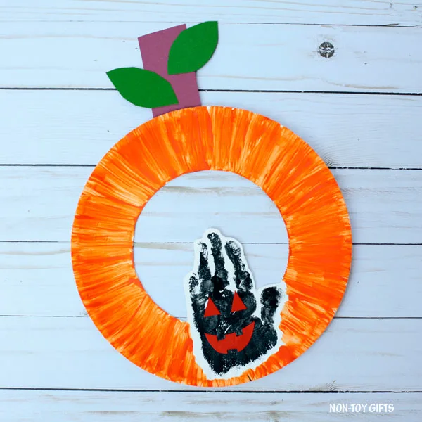 Handprint pumpkin craft for kids