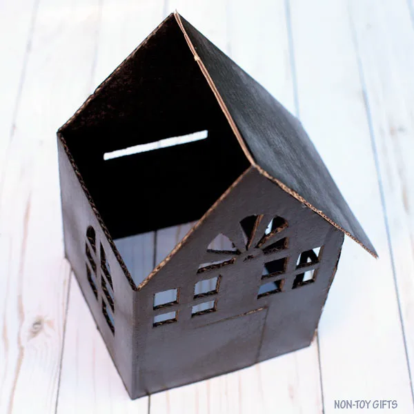 DIY cardboard haunted house luminaries . Glue the roof @Amazon