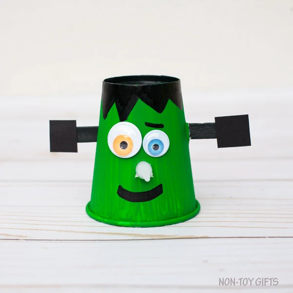 Paper cup Frankenstein with glowing nose
