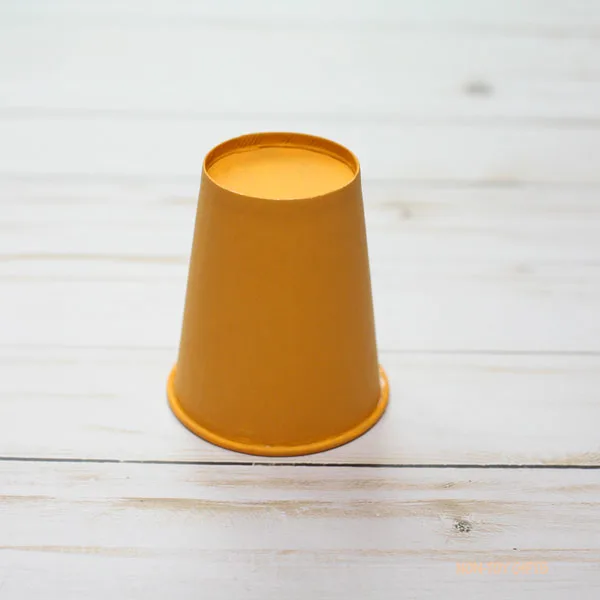 Yellow ochre paper cup
