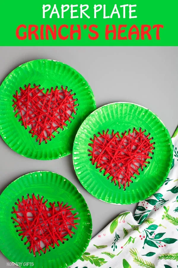 Paper plate Grinch's heart craft for kids. Easy paper plate and yarn Christmas craft for kids #paperplateGrinch #Grinchcraftforkids