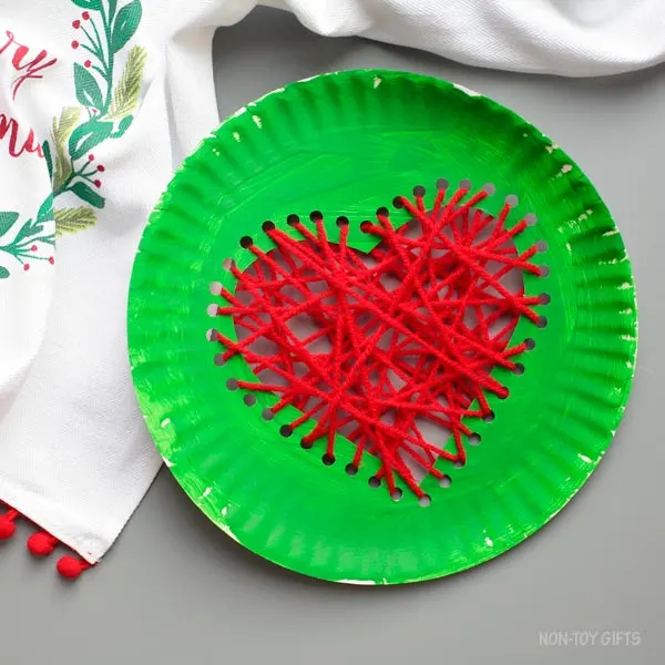Paper plate Grinch's heart craft for kids