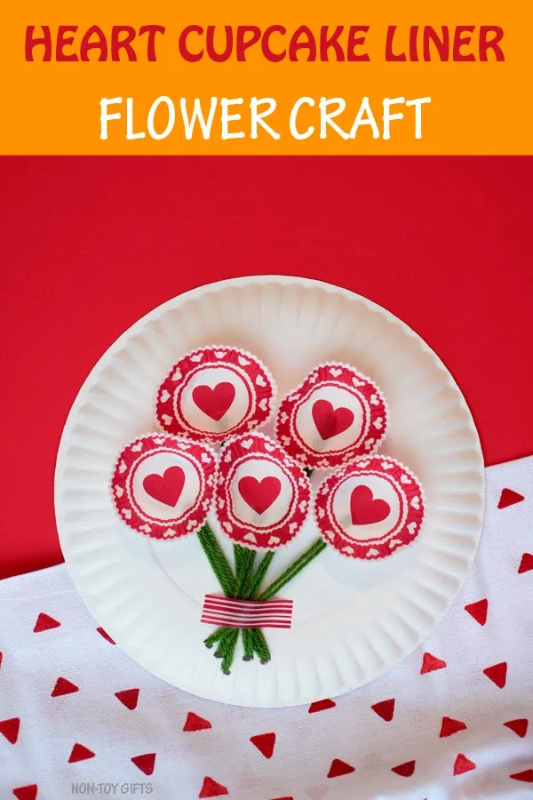 Heart cupcake liner flowers - easy paper plate spring craft for kids. Great for Valentine's Day or Mother's Day #flowers #mothersday #valentinesday #kidscrafts #nontoygifts