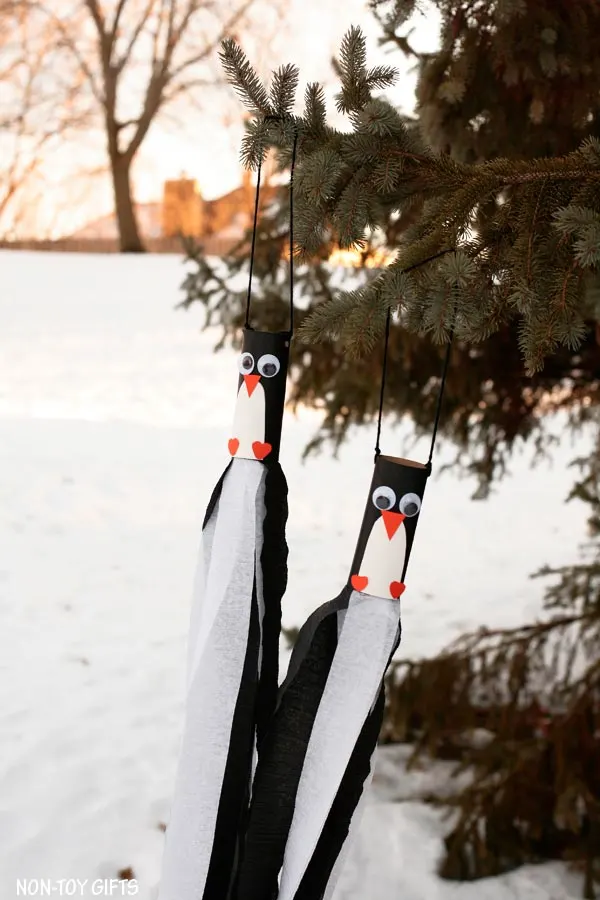 Paper roll penguin windsocks for kids to make