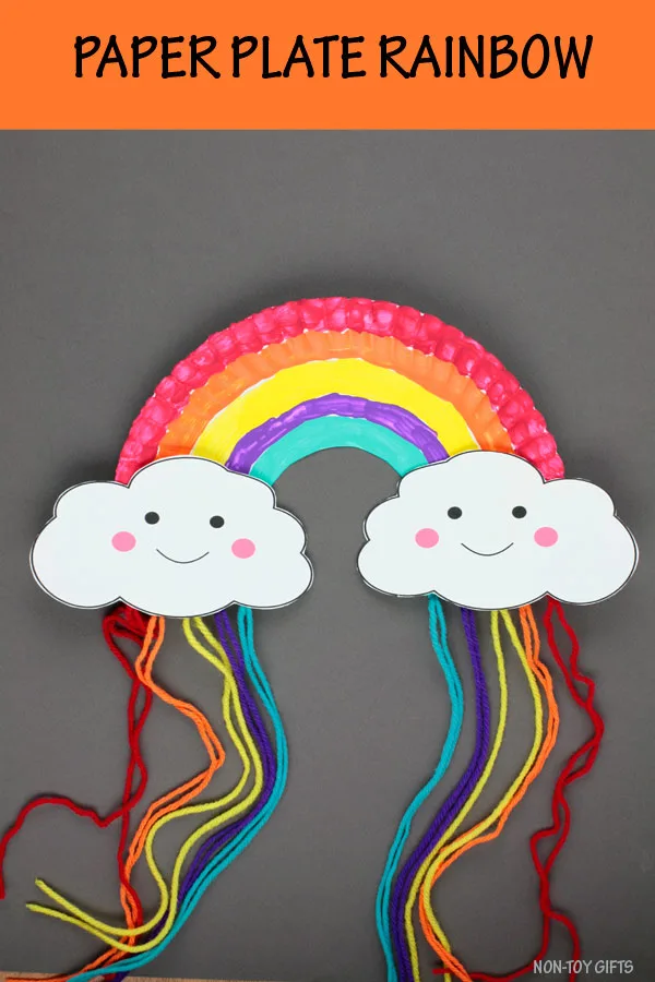 Paper plate rainbow craft for preschoolers and older kids. Use yarn and the free could printable template. Easy paper spring craft. #rainbowcraft #paperplatecraft #nontoygifts #yarncraft