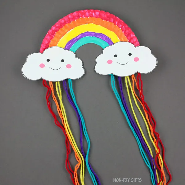 Paper plate and yarn rainbow craft for kids