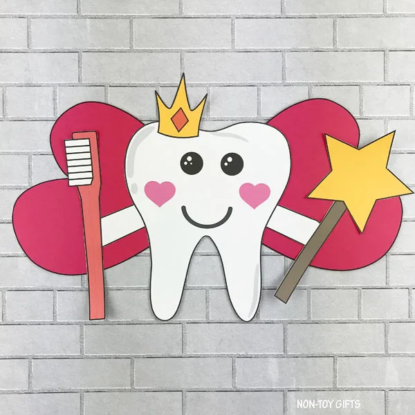 Tooth fairy with magic wand and toothbrush